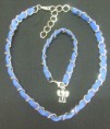 Conjunto collar y pulsera cadena plana y cordon ancho.